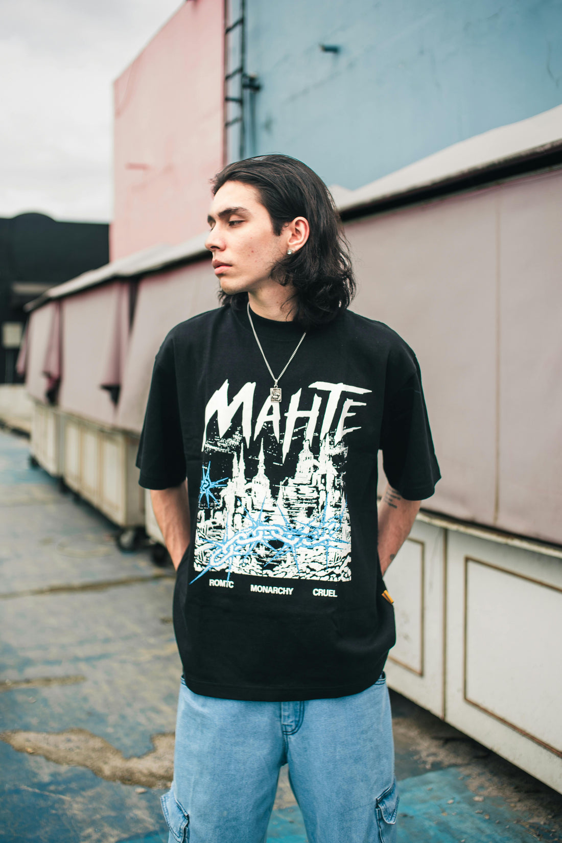 Young man wearing graphic love t-shirt urban fashion